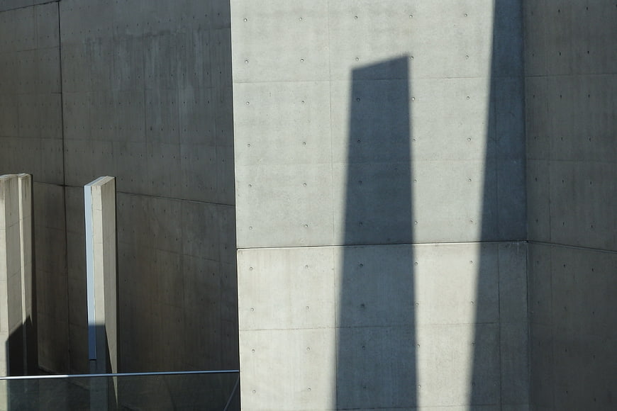 Modern Concrete Architecture with Geometric Shadows