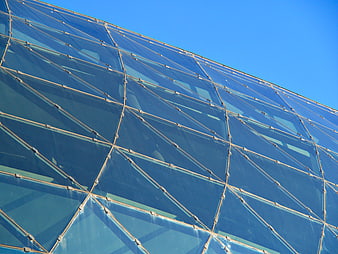 Modern Glass Building Facade with Geometric Pattern