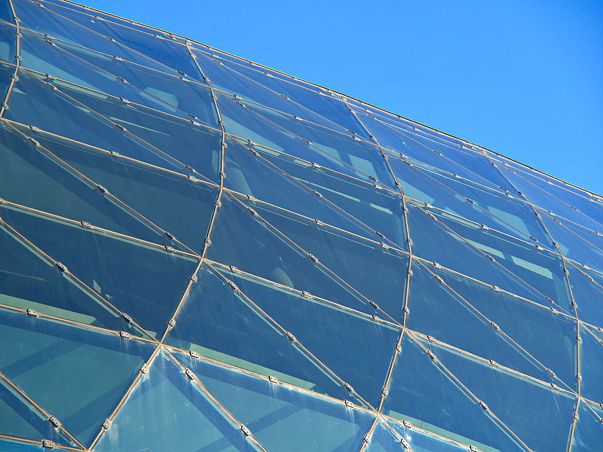 Modern Glass Building Facade with Geometric Pattern