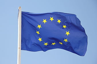 European Union Flag Waving Against Clear Blue Sky