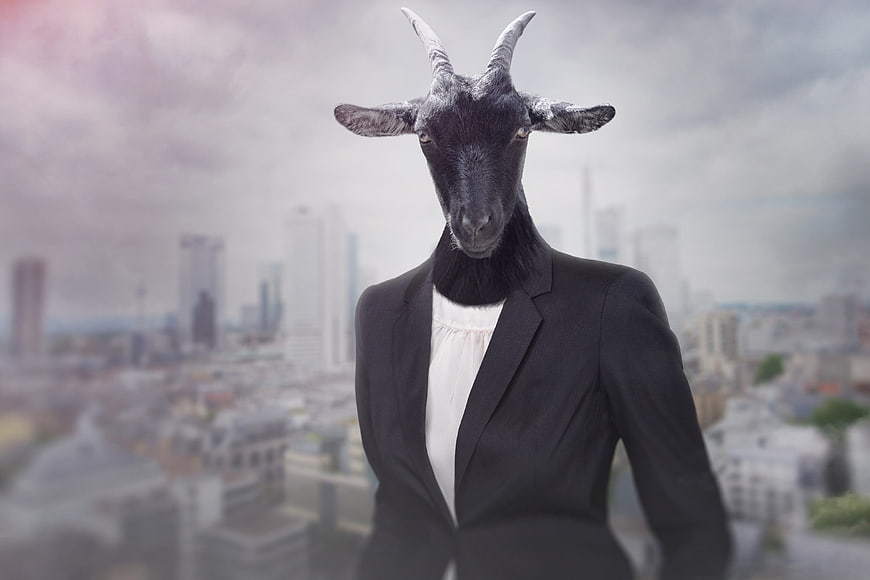 Goat Head Business Woman in Suit with City Skyline Background
