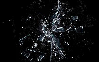 Shattered Glass Fragments Exploding Against Black Background