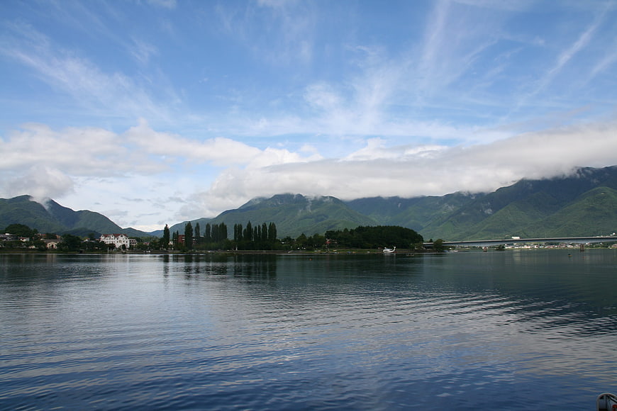 Serene Lake View with Mountains and Clouds in Japan