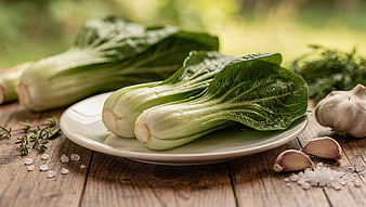 Fresh Bok Choy with Garlic and Herbs on Wooden Table