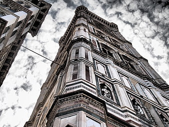 Low angle view of historic Florence church tower facade