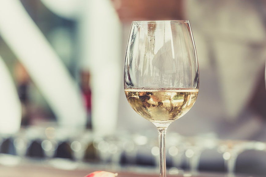 Glass of White Wine with Blurred Background