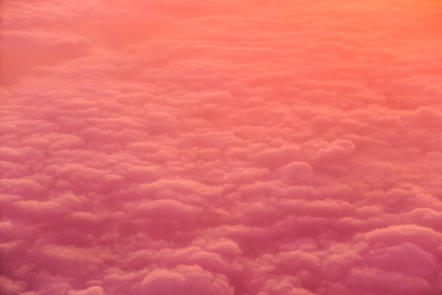 Vibrant Pink and Orange Cloud Sea at Sunset