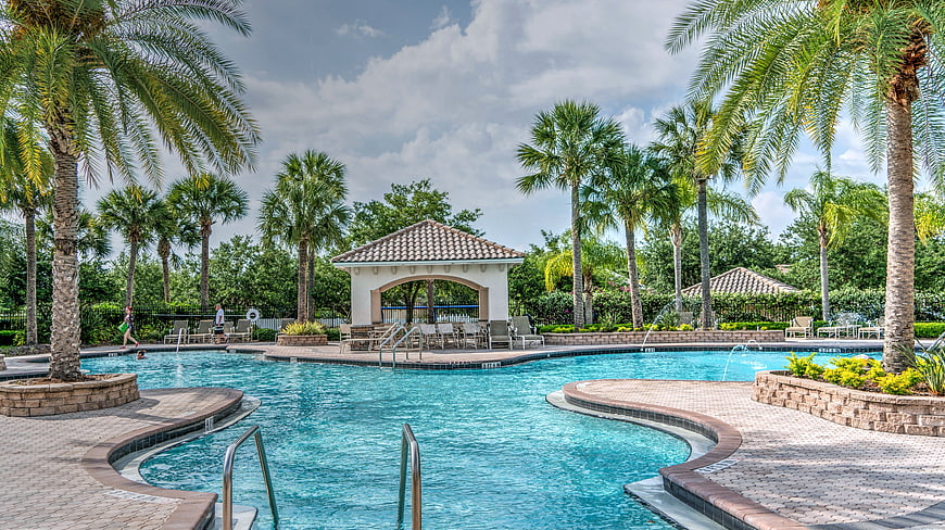 Luxury Resort Swimming Pool with Palm Trees and Gazebo