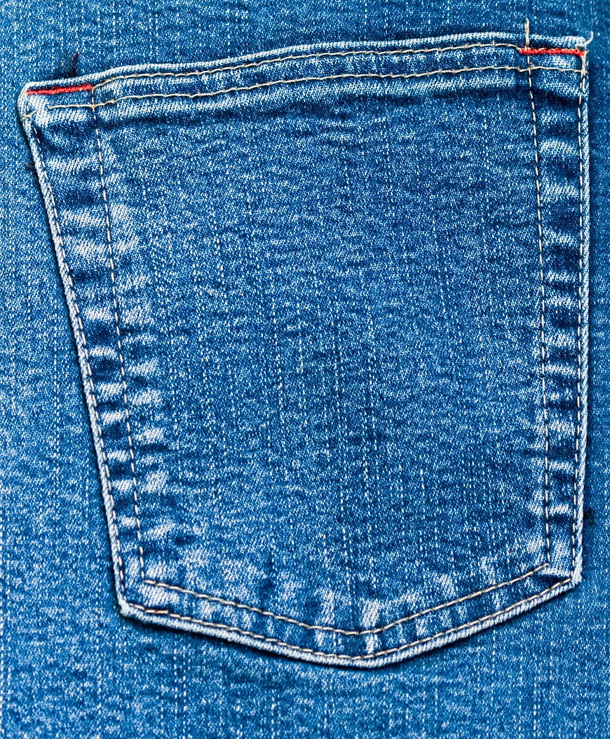 Close-up of Blue Denim Jeans Pocket with Stitching