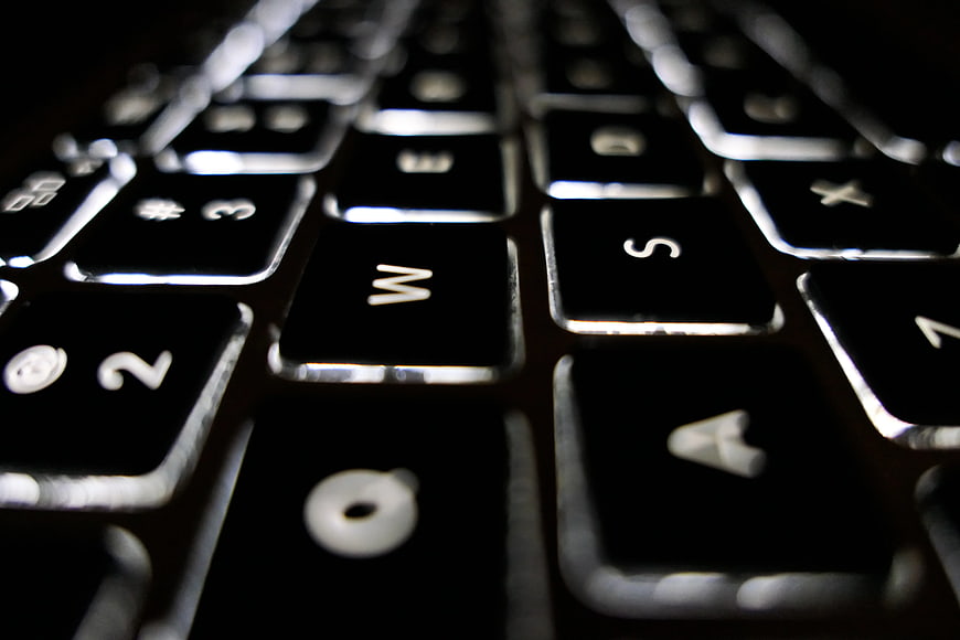 Close-up of black computer keyboard keys with shallow depth of field