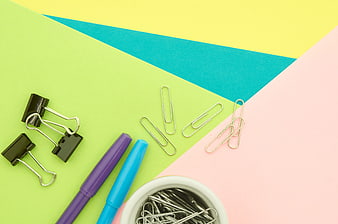 Colorful Office Supplies Flat Lay on Geometric Background