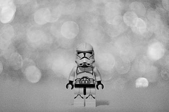 Black and white LEGO Star Wars stormtrooper minifigure with bokeh background