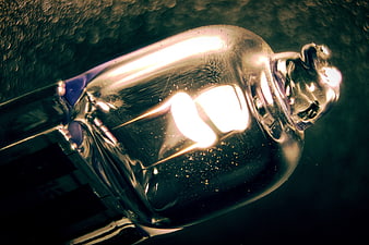 Macro Close-Up of Glowing Vintage Light Bulb Filament