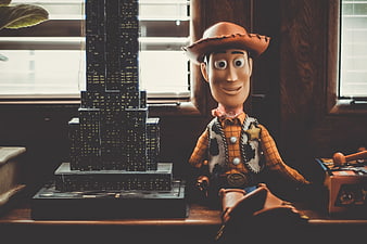 Woody Toy Story Figure Next to Skyscraper Puzzle
