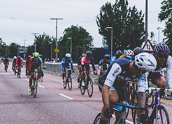 Cyclists racing on a city road during a competitive event