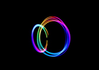 Abstract Rainbow Light Painting Circles on Black Background