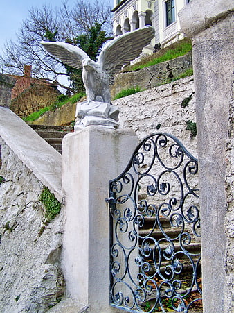 Stone Eagle Statue on Pillar with Wrought Iron Gate