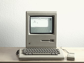 Vintage Apple Macintosh Computer with Keyboard and Mouse