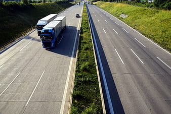 Aerial View of Trucks and Cars on a Multi-Lane Highway