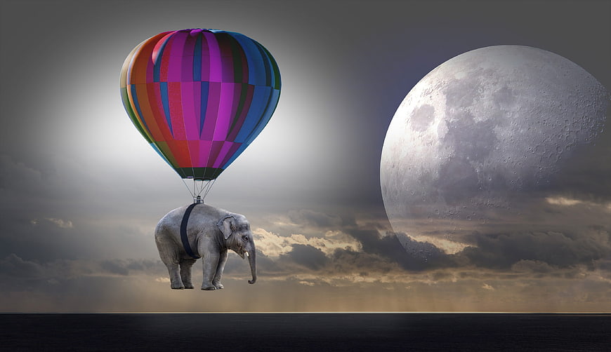 Fantasy Elephant Flying with Hot Air Balloon Near Giant Moon