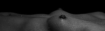 Black and White Close Up of Female Breast and Skin Texture