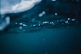 Abstract Underwater Ocean Surface with Blue Bubbles