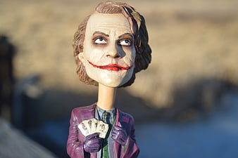 Joker Action Figure with Playing Cards Outdoors