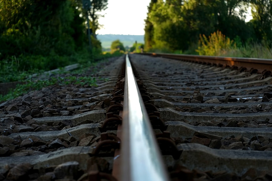 Low Angle Close Up of Train Tracks in Countryside