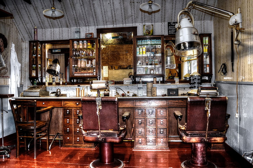 Vintage Barber Shop Interior with Antique Chairs and Tools