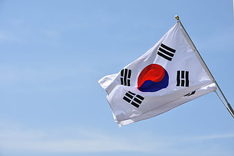 South Korea National Flag Waving Against Clear Blue Sky
