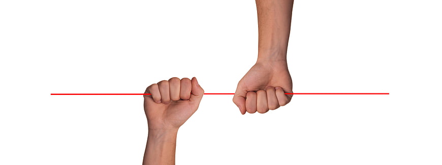 Two Hands Pulling Red String Concept of Teamwork and Collaboration