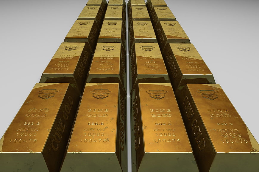 Stack of Gold Bars on White Background