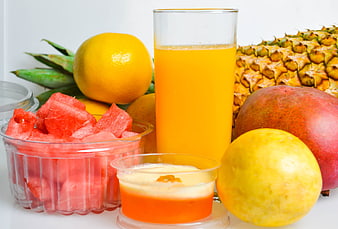 Fresh tropical fruit juice with pineapple, mango, and watermelon