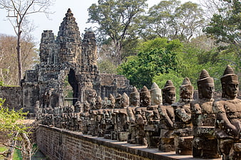 Ancient Stone Guardian Statues at Angkor Thom Temple Ruins