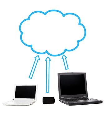 Cloud computing concept with laptops and smartphone