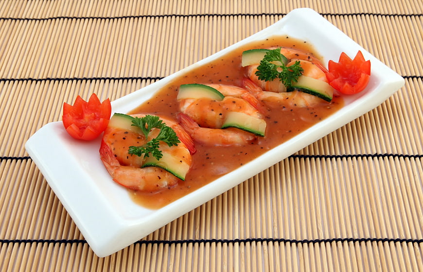 Gourmet Shrimp Appetizer with Sauce on Bamboo Mat