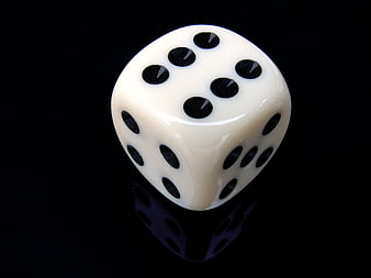 White Dice Showing Six On Black Background