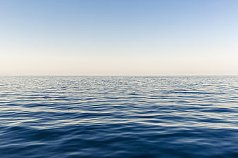 Serene Blue Ocean Horizon with Gentle Waves