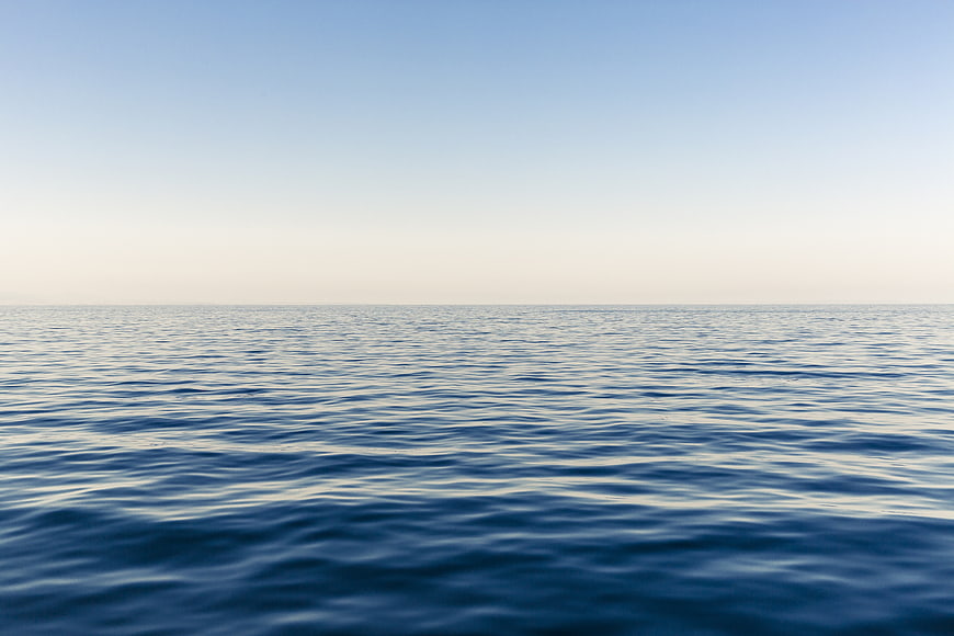 Serene Blue Ocean Horizon with Gentle Waves