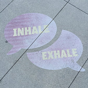 Inhale Exhale Street Art on Concrete Pavement
