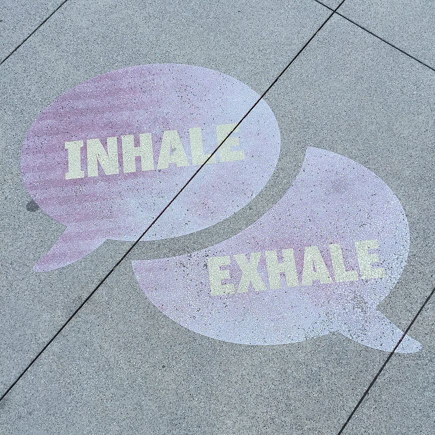 Inhale Exhale Street Art on Concrete Pavement