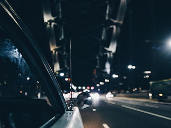 Night driving view from car window on city highway