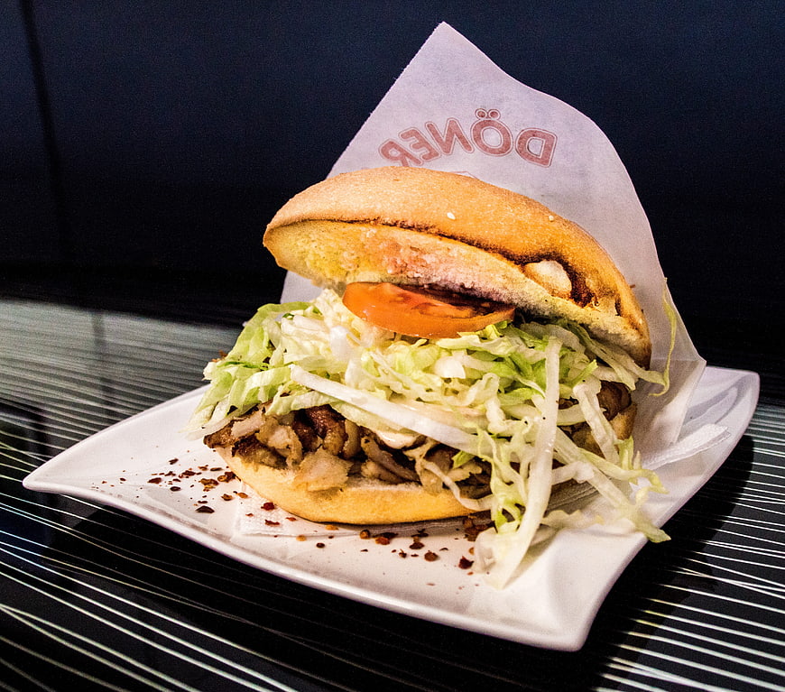 Delicious Döner Kebab Sandwich on White Plate