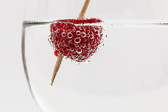 Raspberry in Sparkling Water with Bubbles