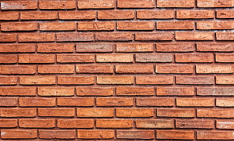 Textured Orange Brick Wall Background Pattern