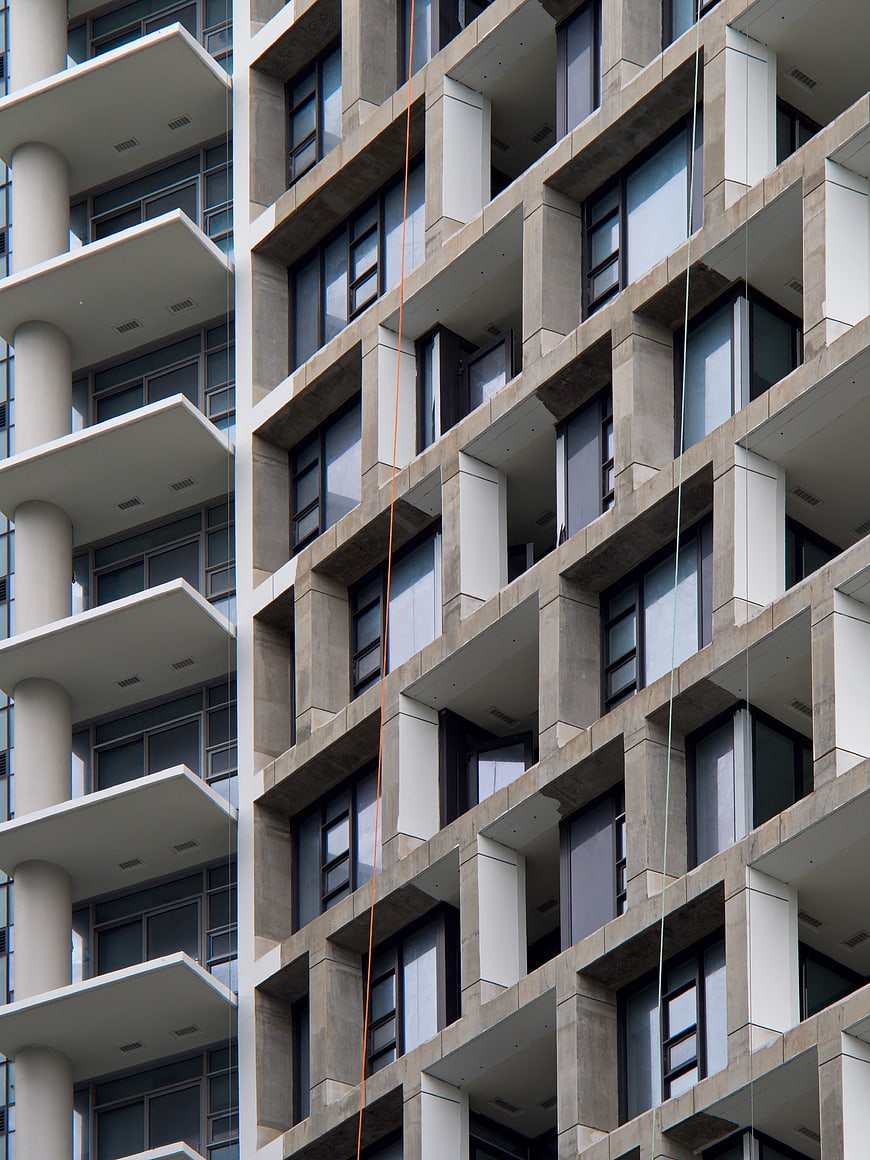 Modern Concrete Apartment Building Facade with Balconies