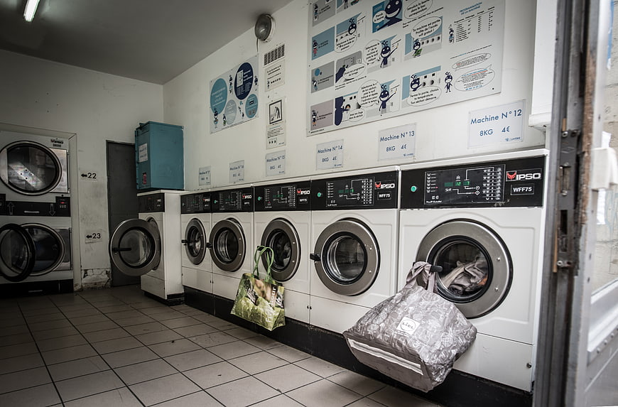 Interior of a self-service laundromat with washing machines