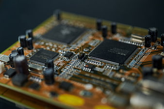 Macro shot of electronic circuit board with microchips