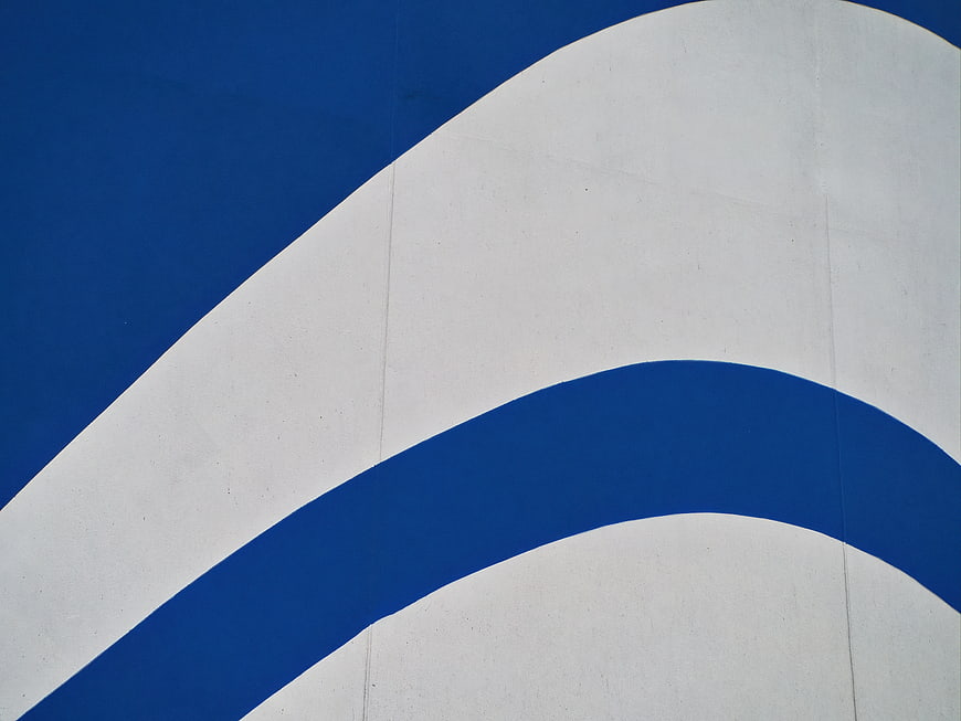 Abstract Blue and White Curved Wall Pattern
