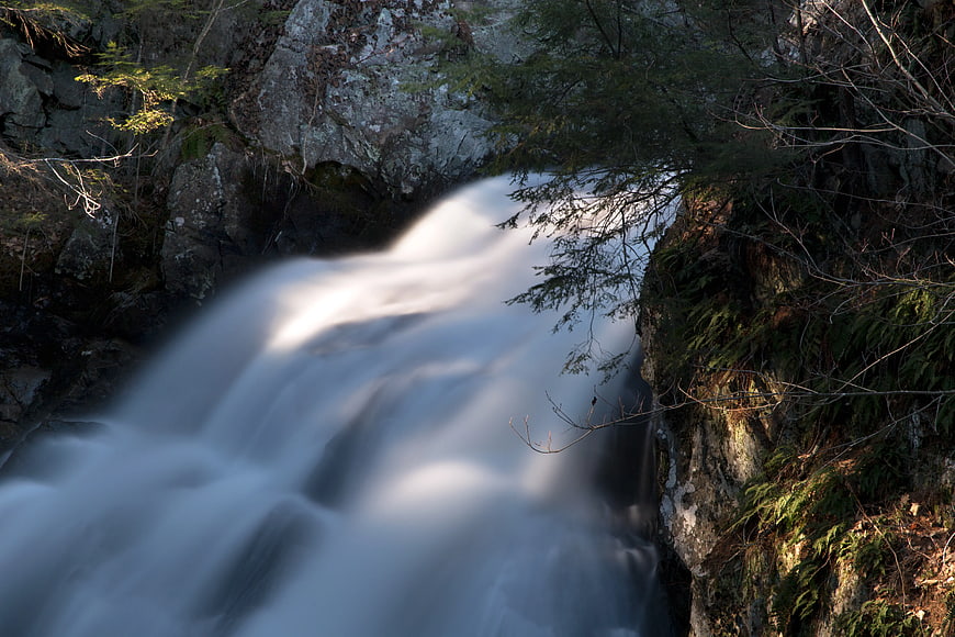 Long Exposure Waterfall in Rocky Forest Gorge